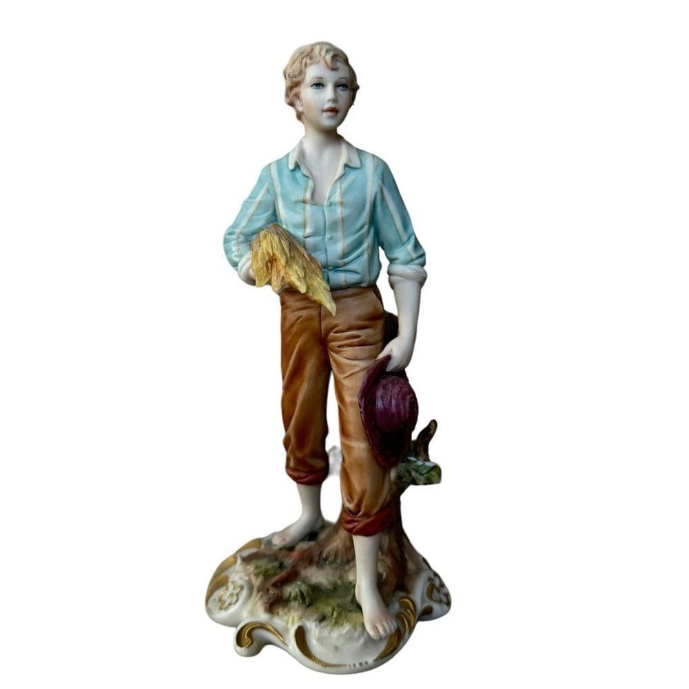 Handmade vintage porcelain boy figurine by Sandro Maggioni capodimonte stamp